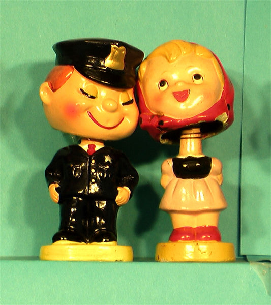 Vintage Kissing Cop Bobblehead