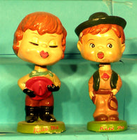 Vintage Kissing cowgirl bobbleheads